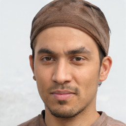 Neutral white young-adult male with short  black hair and brown eyes