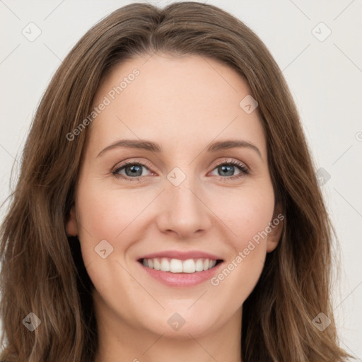 Joyful white young-adult female with long  brown hair and green eyes