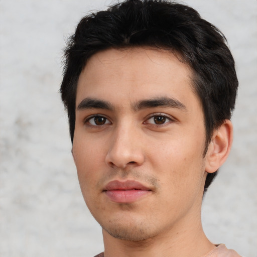 Neutral white young-adult male with short  black hair and brown eyes
