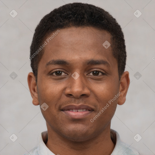 Joyful latino young-adult male with short  brown hair and brown eyes