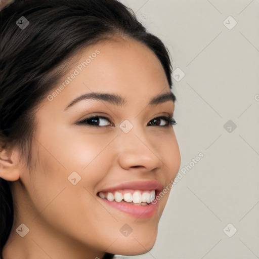 Joyful latino young-adult female with long  brown hair and brown eyes