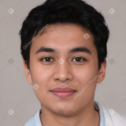 Joyful asian young-adult male with short  black hair and brown eyes