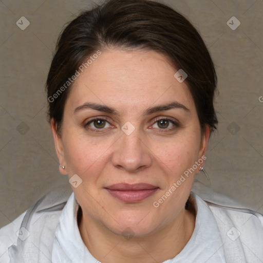 Joyful white adult female with short  brown hair and brown eyes