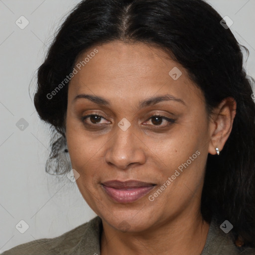 Joyful black adult female with medium  brown hair and brown eyes