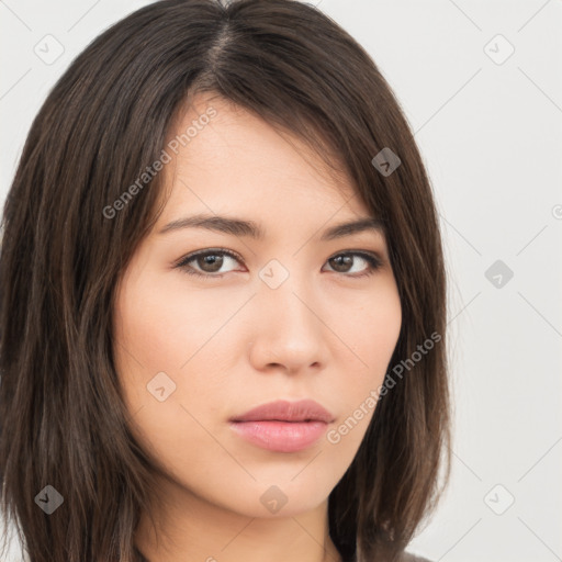 Neutral white young-adult female with long  brown hair and brown eyes