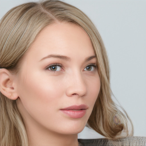 Neutral white young-adult female with medium  brown hair and grey eyes