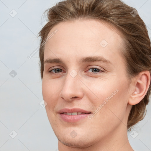 Joyful white young-adult female with medium  brown hair and blue eyes