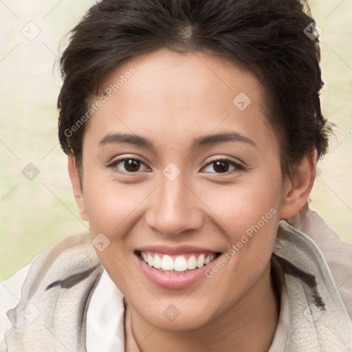 Joyful white young-adult female with short  brown hair and brown eyes