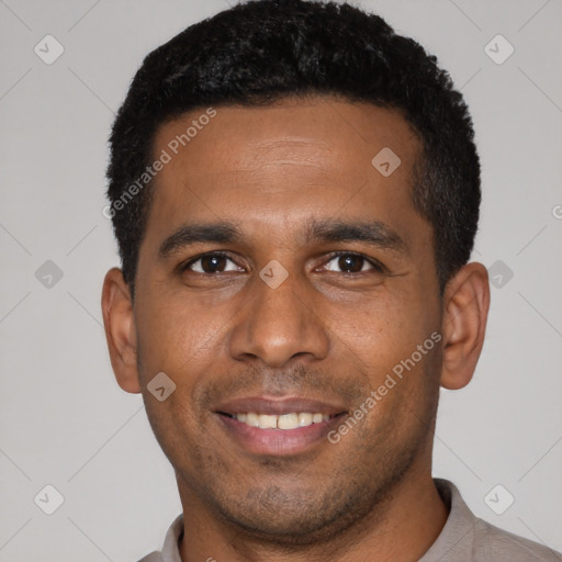 Joyful latino young-adult male with short  black hair and brown eyes