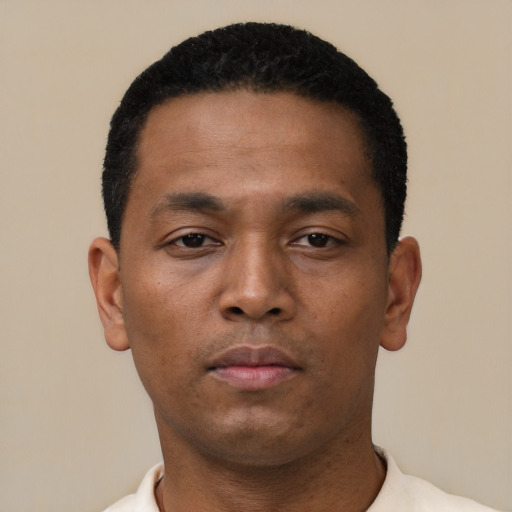 Neutral black young-adult male with short  black hair and brown eyes