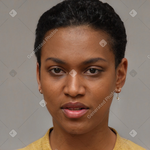 Joyful black young-adult female with short  black hair and brown eyes