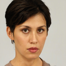 Neutral white young-adult female with short  brown hair and brown eyes