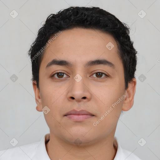 Neutral latino young-adult male with short  black hair and brown eyes