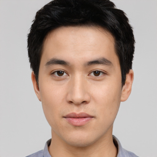 Neutral asian young-adult male with short  black hair and brown eyes