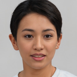 Joyful asian young-adult female with short  brown hair and brown eyes