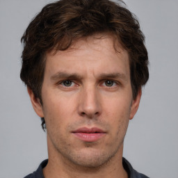 Neutral white adult male with short  brown hair and brown eyes