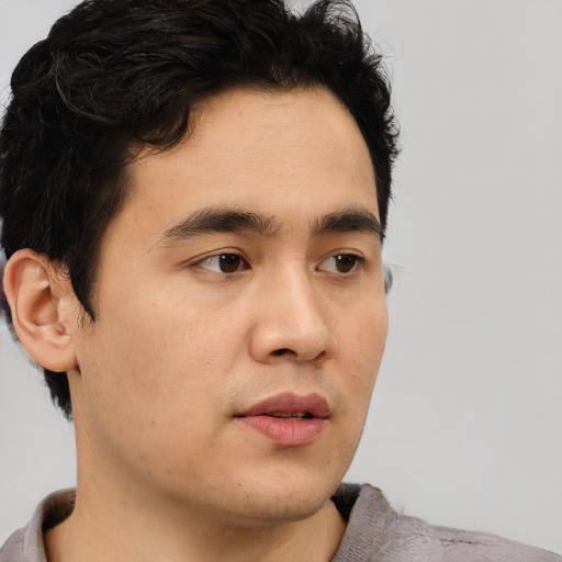 Neutral asian young-adult male with short  brown hair and brown eyes