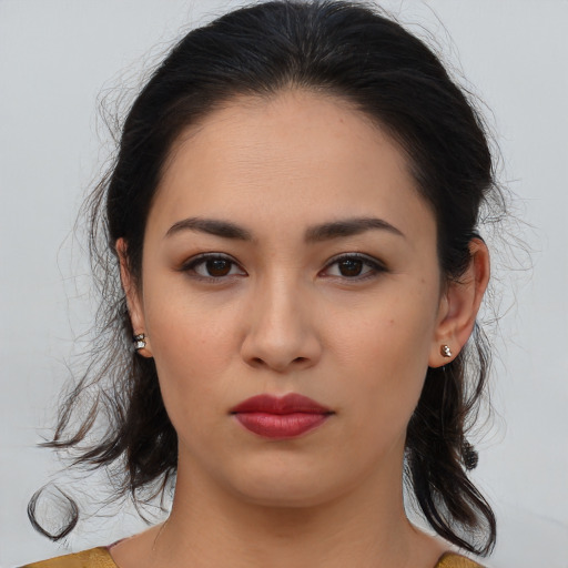 Neutral asian young-adult female with medium  brown hair and brown eyes