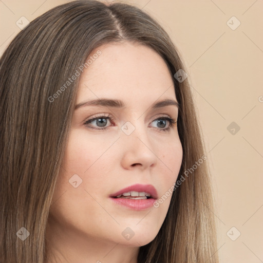 Neutral white young-adult female with long  brown hair and brown eyes