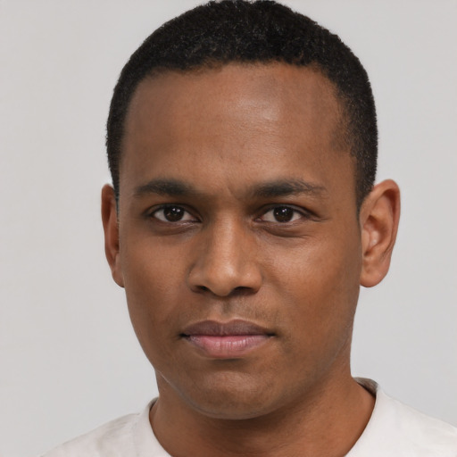 Neutral black young-adult male with short  black hair and brown eyes