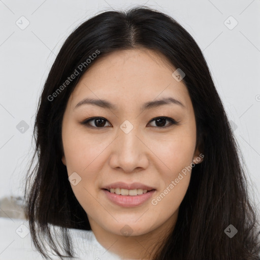 Joyful asian young-adult female with long  brown hair and brown eyes