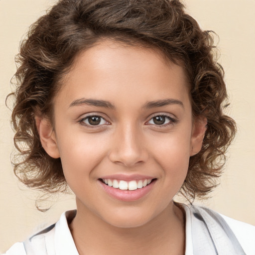 Joyful white child female with medium  brown hair and brown eyes