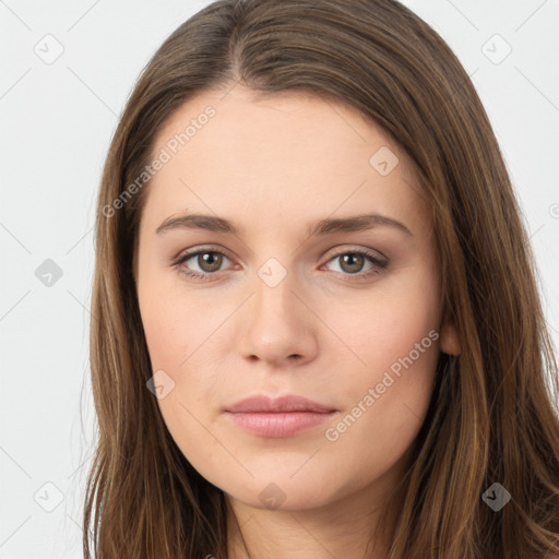 Neutral white young-adult female with long  brown hair and brown eyes