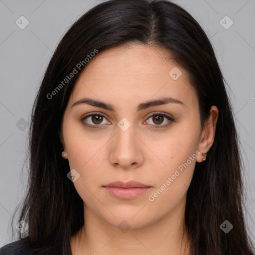 Neutral white young-adult female with long  brown hair and brown eyes