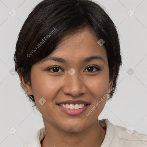 Joyful asian young-adult female with short  brown hair and brown eyes