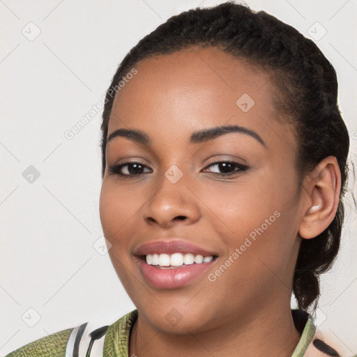 Joyful latino young-adult female with short  black hair and brown eyes