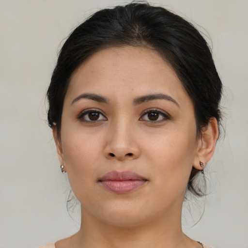 Joyful asian young-adult female with medium  brown hair and brown eyes