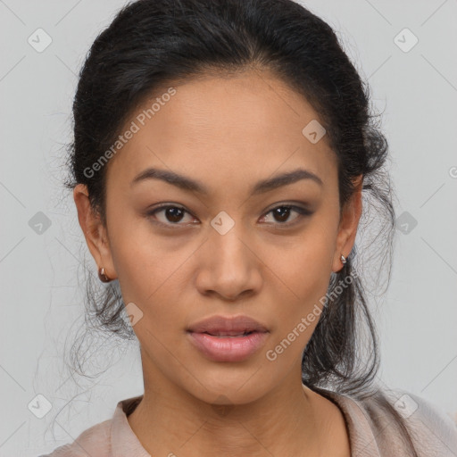 Joyful latino young-adult female with long  brown hair and brown eyes