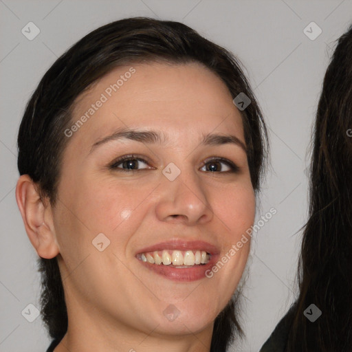 Joyful white young-adult female with medium  brown hair and brown eyes