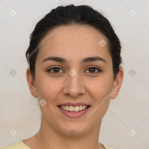 Joyful white young-adult female with short  brown hair and brown eyes