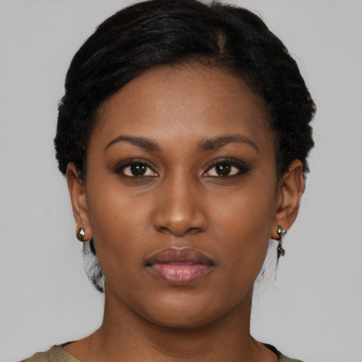 Neutral black young-adult female with short  black hair and brown eyes