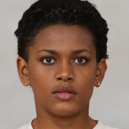 Neutral black young-adult female with short  brown hair and brown eyes