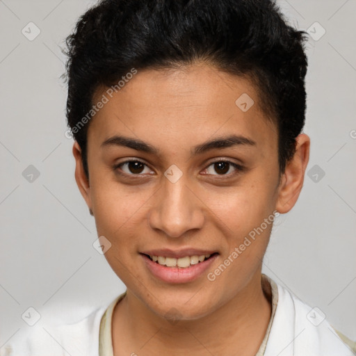 Joyful latino young-adult female with short  brown hair and brown eyes