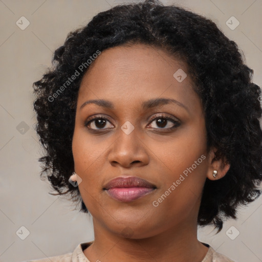 Joyful black young-adult female with medium  black hair and brown eyes