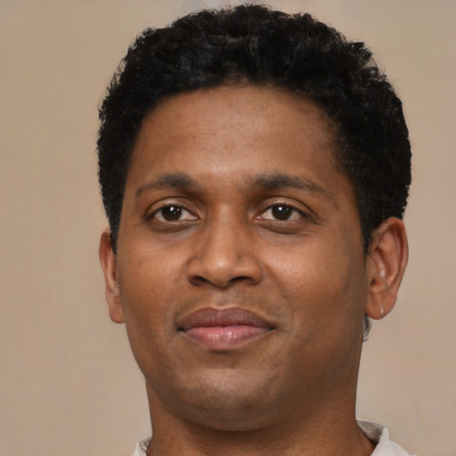Neutral black young-adult male with short  brown hair and brown eyes