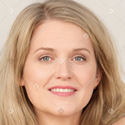 Joyful white young-adult female with long  brown hair and grey eyes