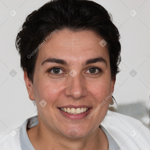 Joyful white adult female with short  brown hair and brown eyes