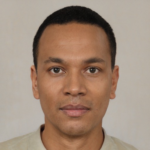 Neutral black young-adult male with short  black hair and brown eyes