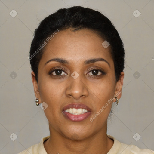 Joyful black young-adult female with short  black hair and brown eyes