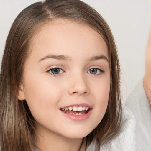 Joyful white child female with long  brown hair and brown eyes