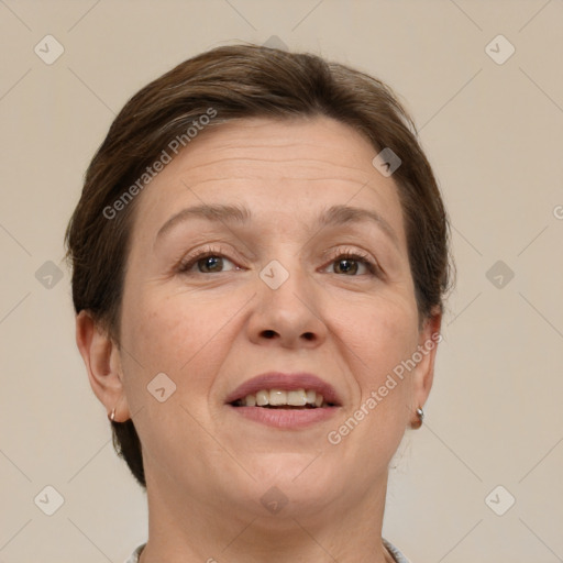 Joyful white adult female with short  brown hair and brown eyes