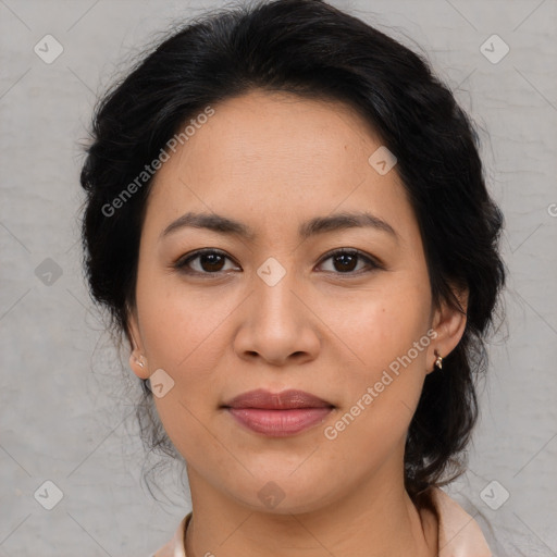 Joyful latino young-adult female with medium  brown hair and brown eyes
