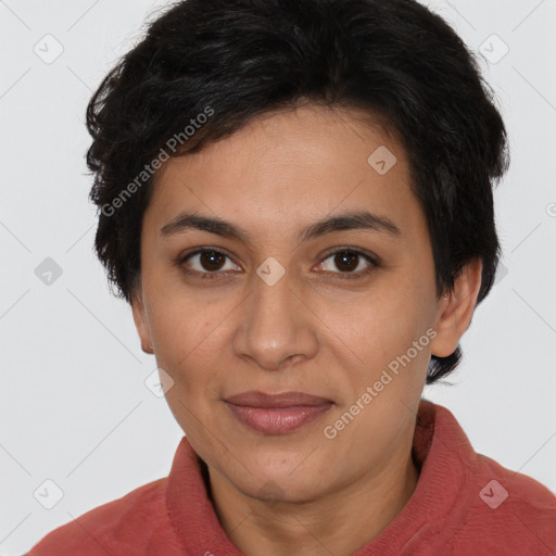 Joyful latino young-adult female with short  brown hair and brown eyes