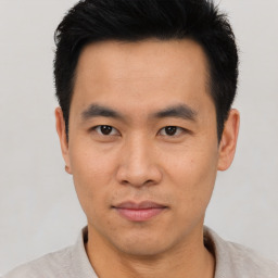 Neutral asian young-adult male with short  black hair and brown eyes