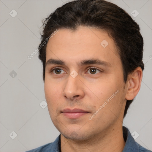 Neutral white young-adult male with short  brown hair and brown eyes