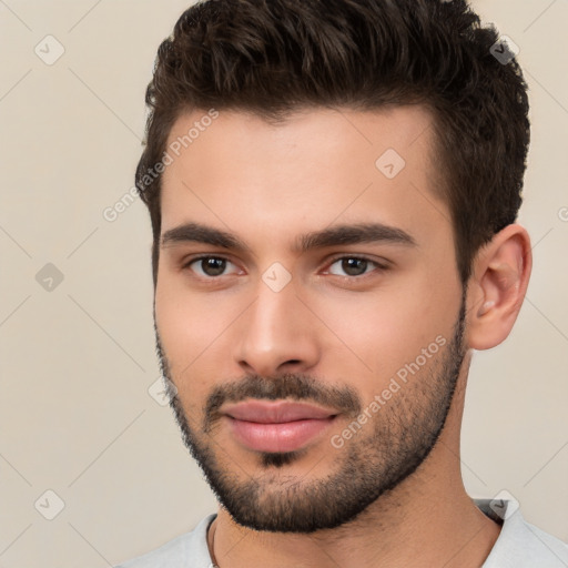 Neutral white young-adult male with short  brown hair and brown eyes